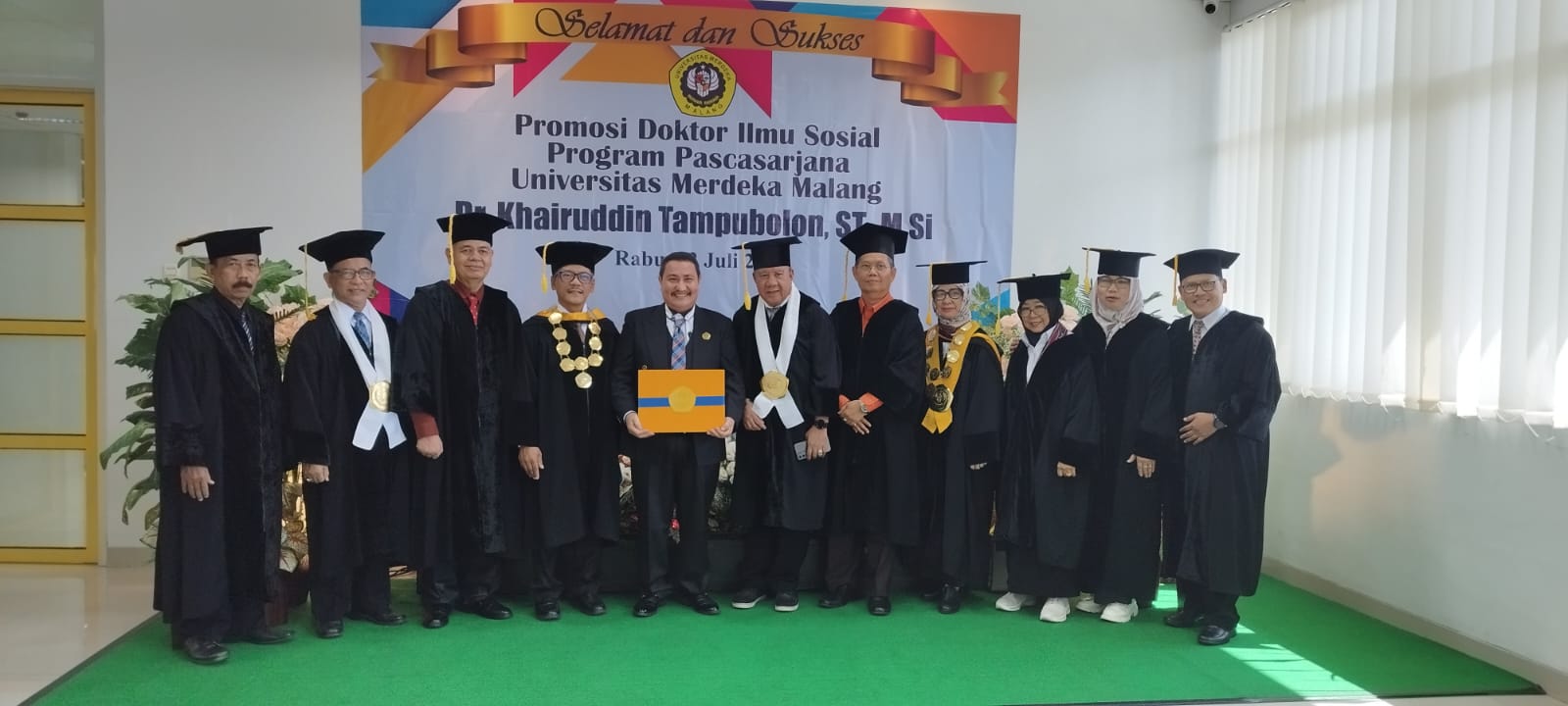 Dr. Khairuddin Tampubolon saat sidang terbuka promosi doktor